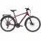 Trekingový bicykel s rovnými riadidlami, blatníkmi a zadným nosičom.